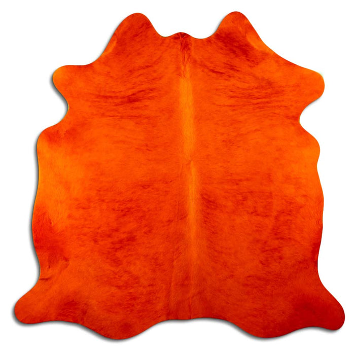 Tapis en peau de vache à poils teints en orange
