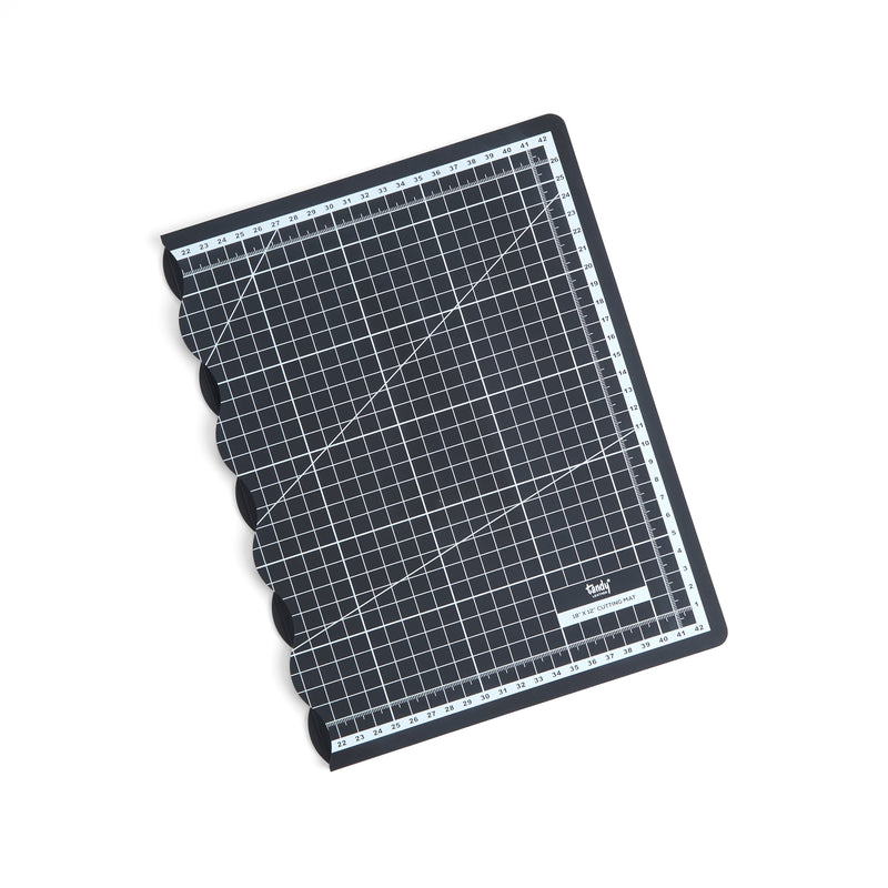 Tapis de découpe pliant quadrillé