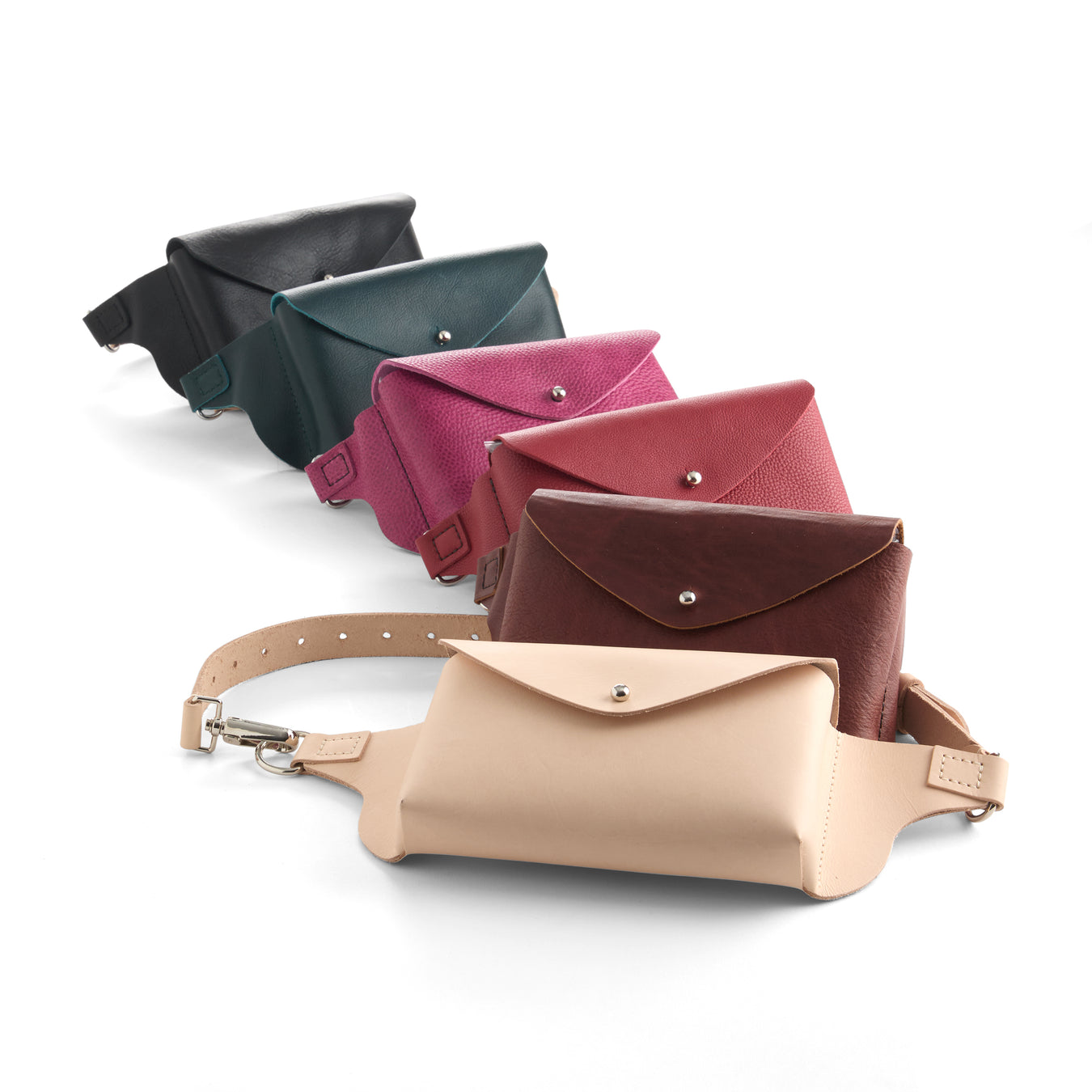 Set of five waist bags in different colors on a white background