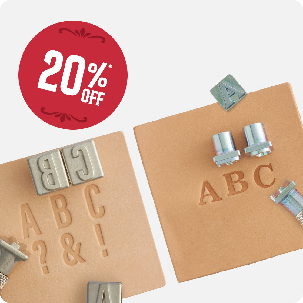 Two tan leather stamps with raised letters and symbols, shown with silver metal letterpress stamps on a light gray background. A red circular '20% OFF' sale badge appears in the top left corner.