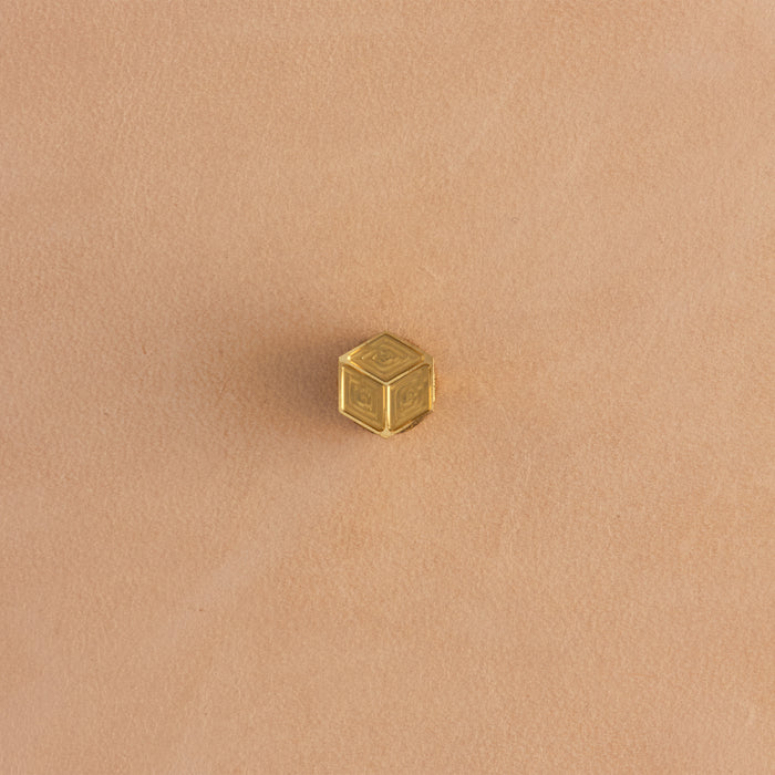 Timbre en laiton cube 3D