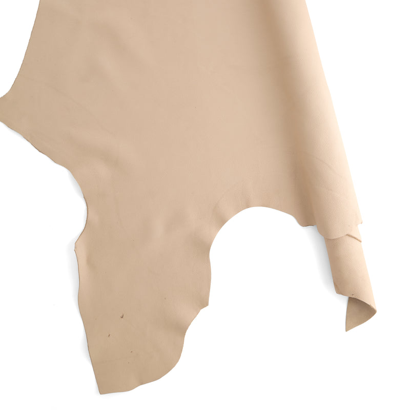 Piel granulada de diseño color marfil